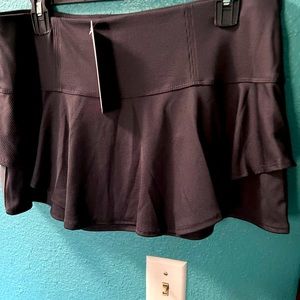 Lucky In Love two piece outfit. Skort Charcoal L and charcoal L Top